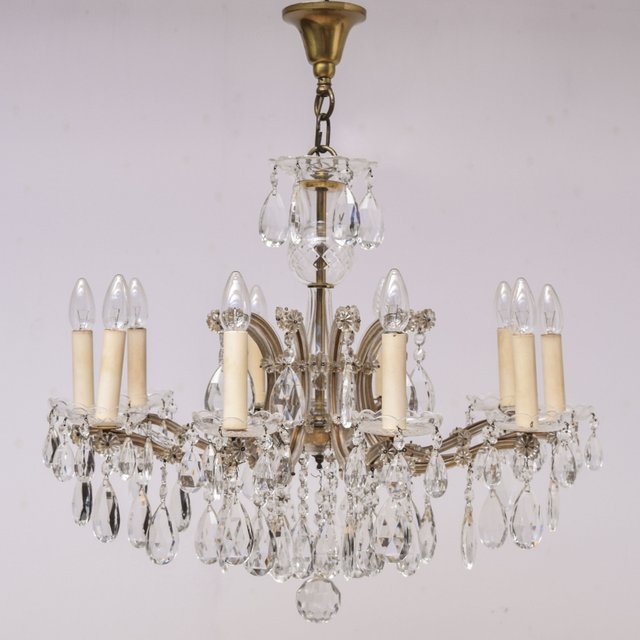 Verkocht artikelnr. 001124 - 10 Lichts Kristallen 'Maria Theresia' Kroonluchter 1920
antiek model

Doorsnede: 60cm

hoogte zonder ketting: 60cm
Keywords: 10 Lichts Kristallen 'Maria Theresia' Kroonluchter 1920